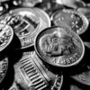 macro photo of round silver-colored coins